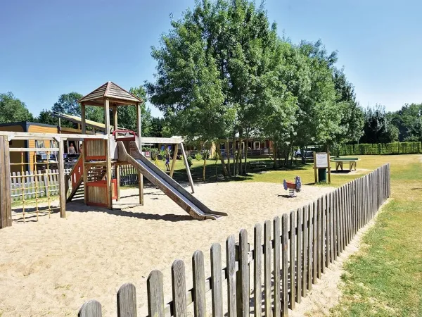 One of the playgrounds at Roan camping Domaine de La Brèche.