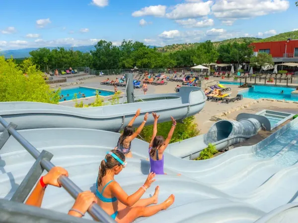 Slide down the slide at Roan camping Aluna Vacances.